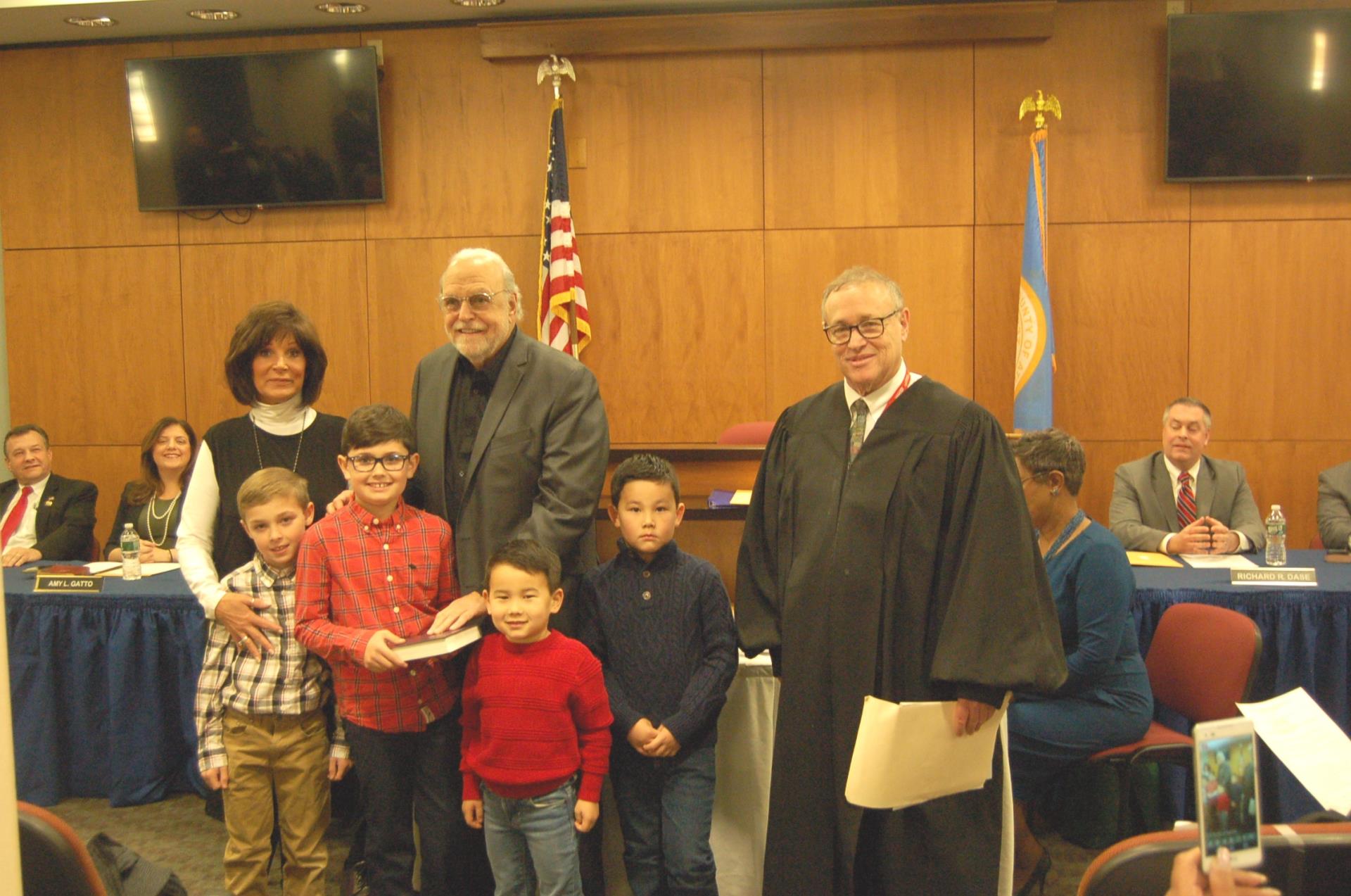 County Executive Dennis Levinson prepares to be sworn into office