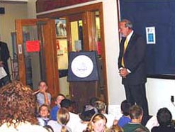 A former history teacher, County Executive Levinson and students