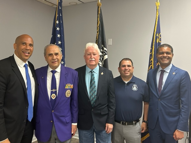 Senator Cory Booker and Dr. Shareef Elnahal with members of the Somers Point VFW.